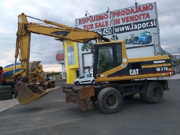 Bager CAT M318, BJ 2001