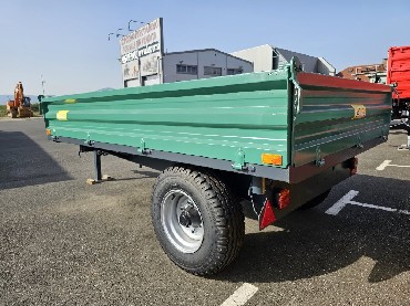 prikolica metal 4 tone s poviski strani